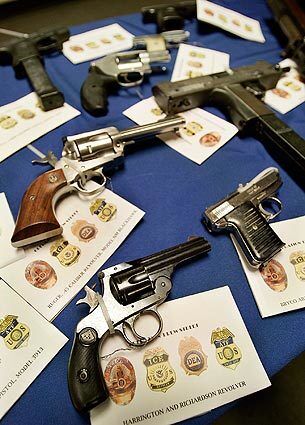 Guns confiscated in the gang sweep in Glassell Park. Twenty-three weapons were seized in the raids, as well as unspecified amounts of heroin, cocaine, methamphetamine, marijuana and cash.