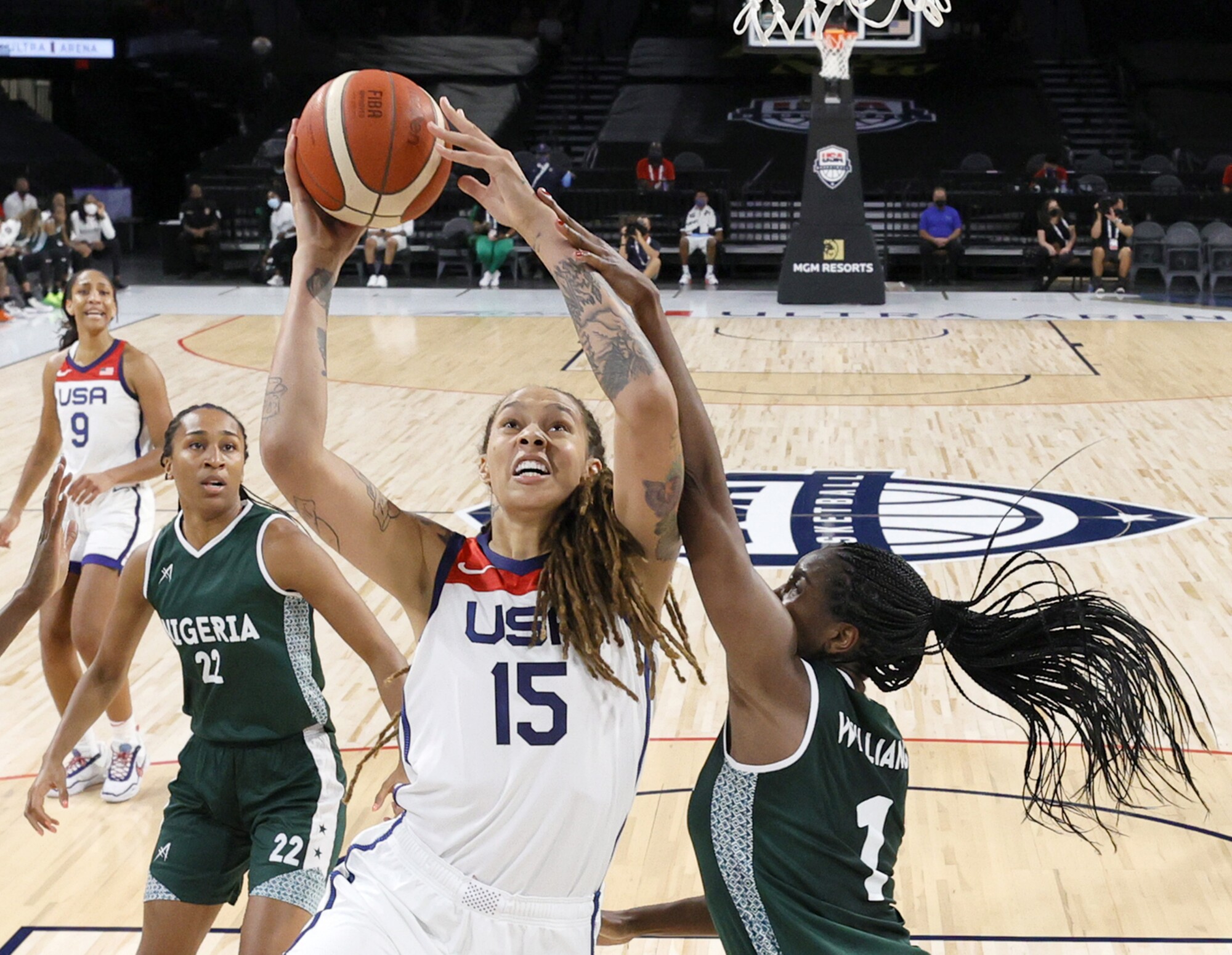 American Brittney Griner scores against Elizabeth Williams, of Nigeria, during an exhibition game on July 18, 2021. 