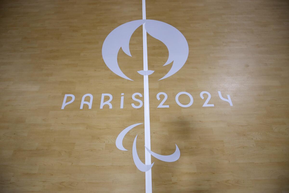 The logo of the Paralympic Games on the Goalball court.