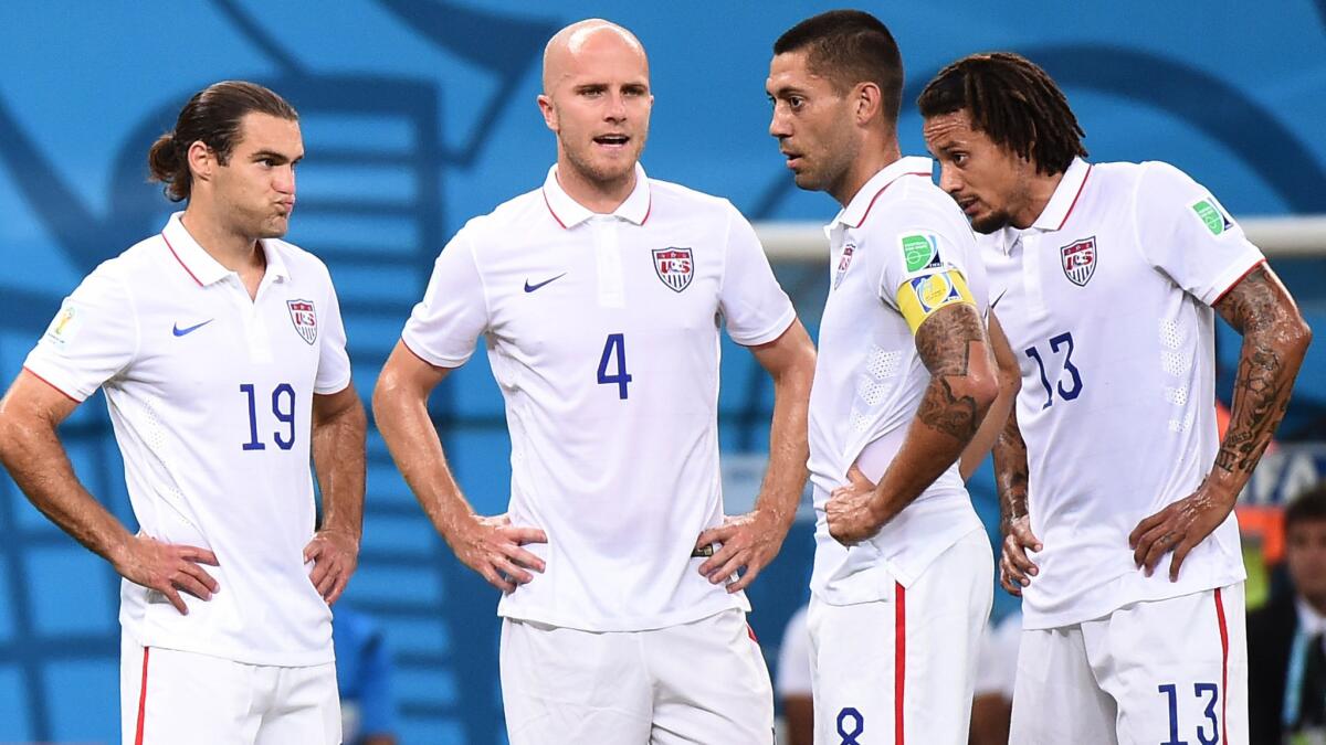 U.S. national soccer team players (from left to right) Graham Zusi, Michael Bradley, Clint Dempsey and Jermaine Jones look on during Sunday's 2-2 draw with Portugal. The U.S. team has tried to maintain a positive attitude as it prepares for Thursday's match against Germany.