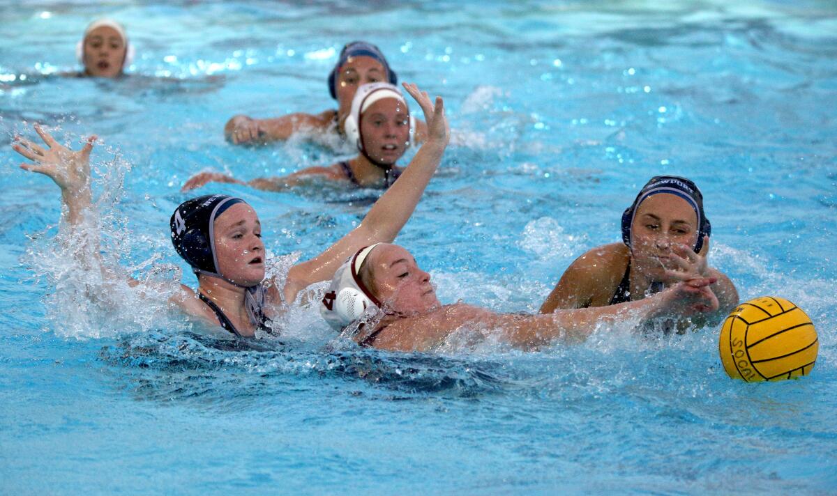 Laguna Beach's Charlotte Riches, center, is pressured by defenders in the CIF Southern Section Open Division title game.