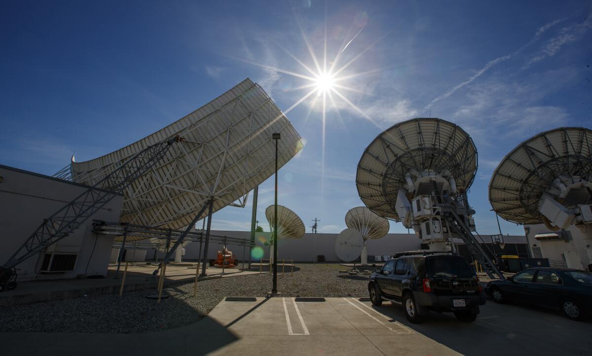 DirectTV satellite dishes. (Allen J. Schaben/Los Angeles Times)