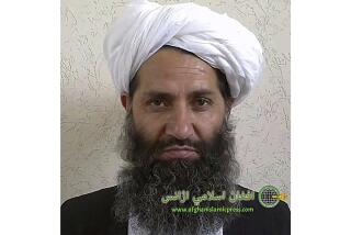 FILE - In this undated photo from an unknown location, released in 2016, the leader of the Afghanistan Taliban Mawlawi Hibatullah Akhundzada poses for a portrait. The Taliban leader has warned Afghans against earning money or gaining worldly honor, at a time when the country is in the grip of humanitarian crises and is isolated on the global stage. (Afghan Islamic Press via AP, File)
