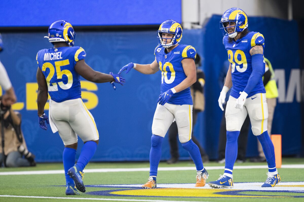 Rams receiver Cooper Kupp celebrates his touchdown with running back Sony Michel and tight end Tyler Higbee.