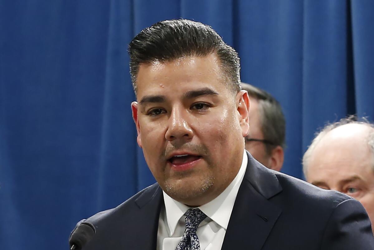 A man is shown while speaking at a news conference.