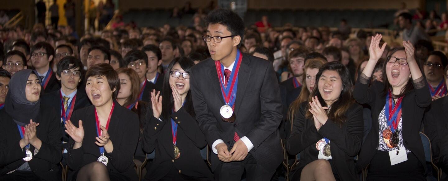 Jae Kyung Chong of Granada Hills Charter heads to the podium to accept the top individual award at the state Academic Decathlon.
