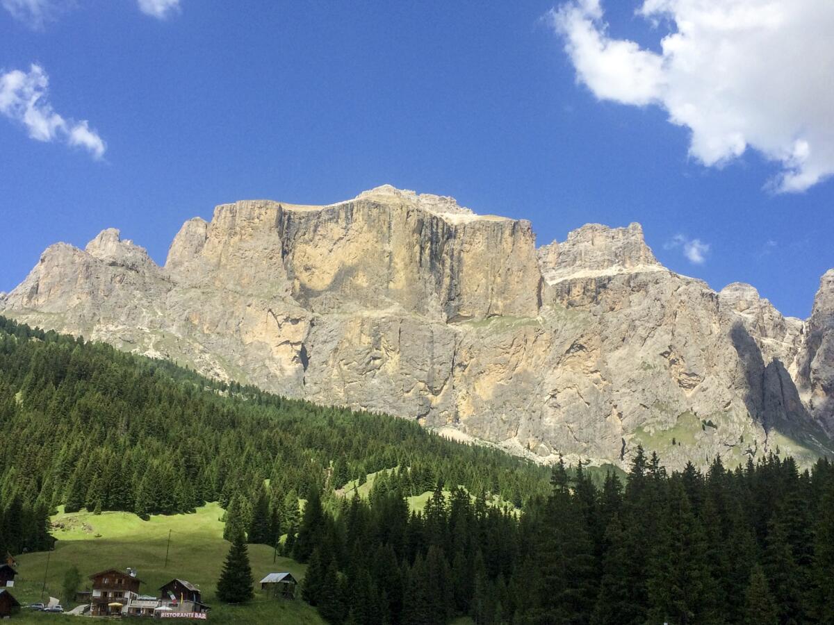 Northeast Italy: The Dolomites loom above Pordoi Pass, west of Cortina d'Ampezzo, Italy.