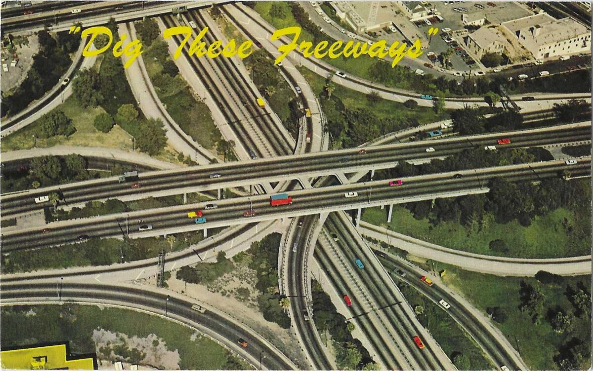 An aerial view of a freeway interchange with the words "Dig These Freeways"