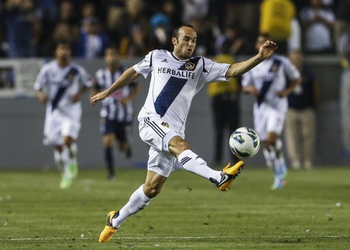 Landon Donovan. shown in action with the L.A. Galaxy, will play for the U.S. in World Cup qualifiers next month.