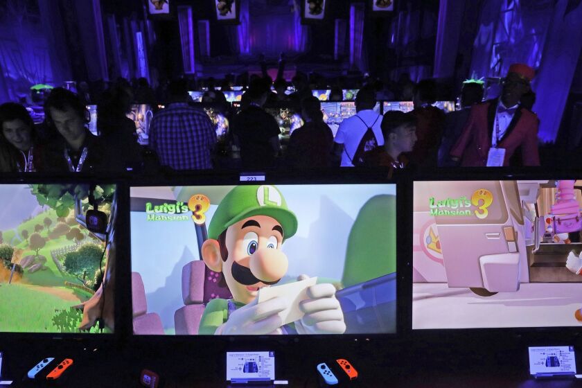 LOS ANGELES, CA -- JUNE 11, 2019: Nintendo's "Luigi's Mansion 3" display and demonstration booth during E3 at the Los Angeles Convention Center. (Myung J. Chun / Los Angeles Times)