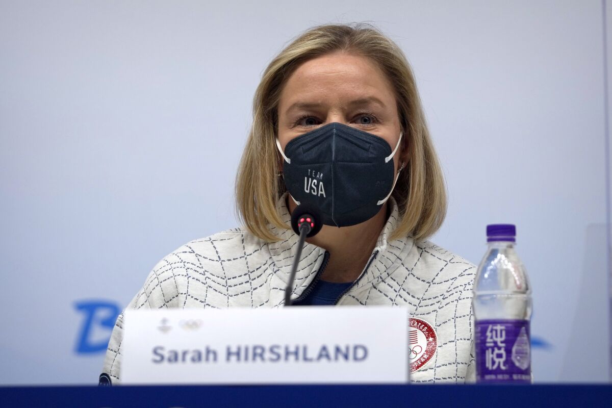 United States Olympic and Paralympic Committee CEO Sarah Hirshland speaks during a press conference at the 2022 Winter Olympics, Friday, Feb. 4, 2022, in Beijing. (AP Photo/Mark Schiefelbein)