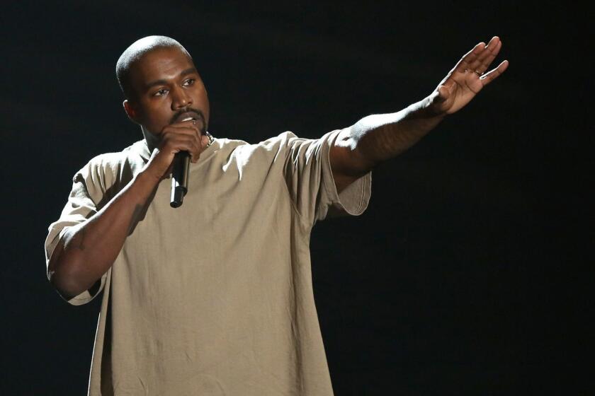 Kanye West accepts the video vanguard award at the MTV Video Music Awards at the Microsoft Theater on Sunday, Aug. 30, 2015, in Los Angeles. (Photo by Matt Sayles/Invision/AP) ORG XMIT: CARA250