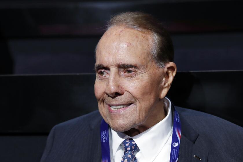 FILE - In this July 18, 2016 file photo, political icon and 1996 Republican presidential nominee Sen. Bob Dole is seen at the Republican National Convention in Cleveland. Dole says he has been diagnosed with stage 4 lung cancer. The 97-year-old former U.S. Senate majority leader said Thursday in a short statement that he would begin treatment for the disease Monday. (AP Photo/Carolyn Kaster)