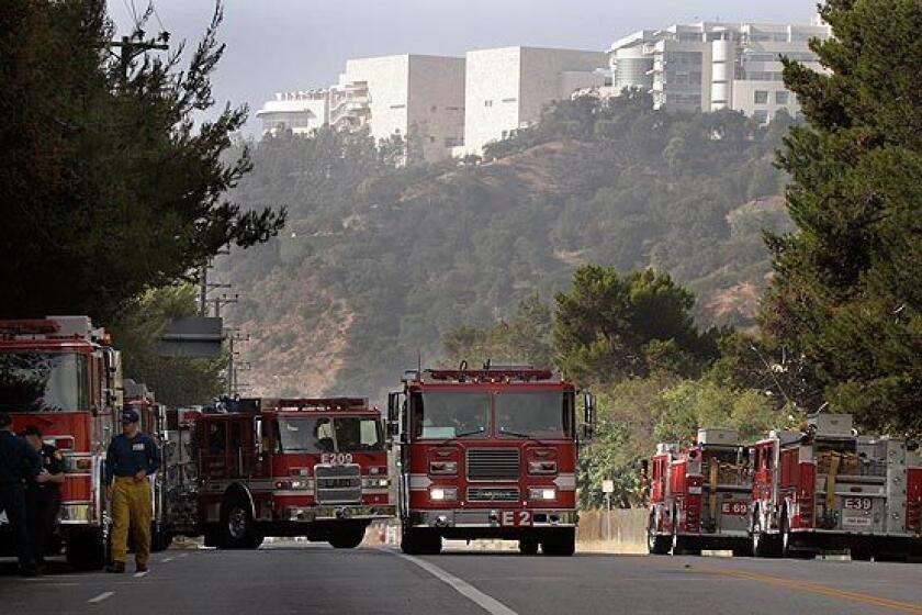 Fire trucks at a staging area on Sepulveda Boulevard at the Getty Center entrance.