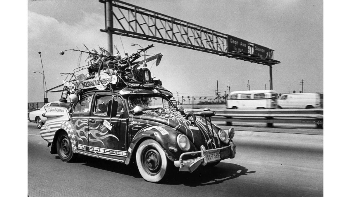 May 10, 1978: A Volkswagen beetle spotted on the northbound 110 Freeway with Cadillac fins, a Christmas tree and a kerosene lantern.