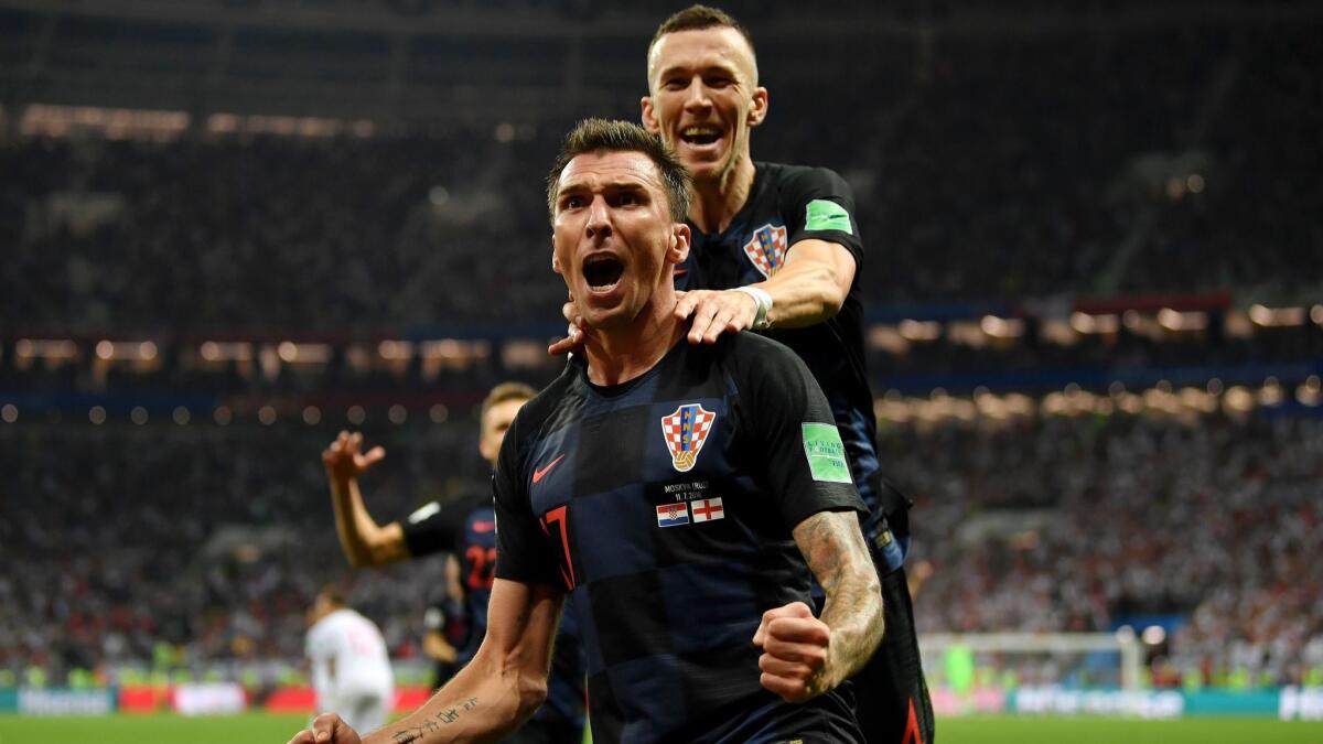 Croatia's Mario Mandzukic celebrates after scoring during the second overtime against England on July 11 in Moscow.