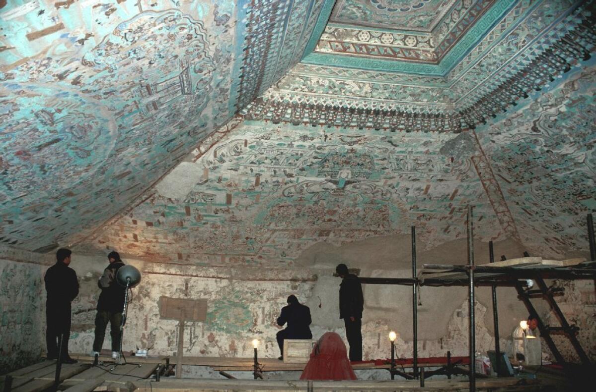 The Mogao Grottoes, a vast network of 492 caves in China, are covered with Buddhist murals. Exact replicas of three of the painted caves will come to the Getty Center in a 2016 show that also will include artifacts from the caves.