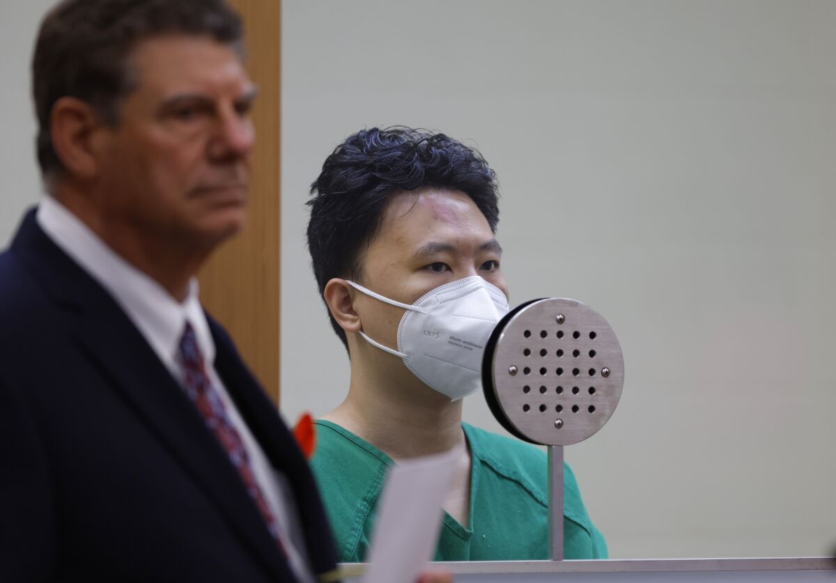 Yuhao Du appears in San Diego Superior Court with attorney Howard Cohn for an arraignment, which was postponed a week.