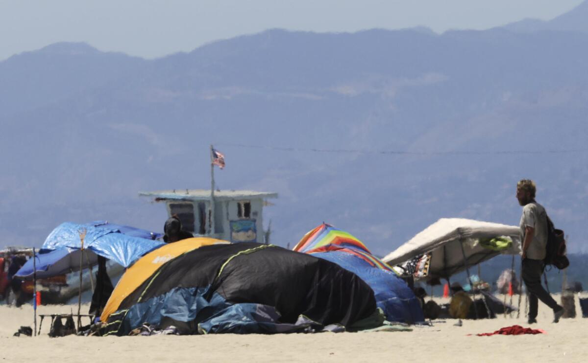  A few homeless encampments remain on the beach in Venice on July 29. 