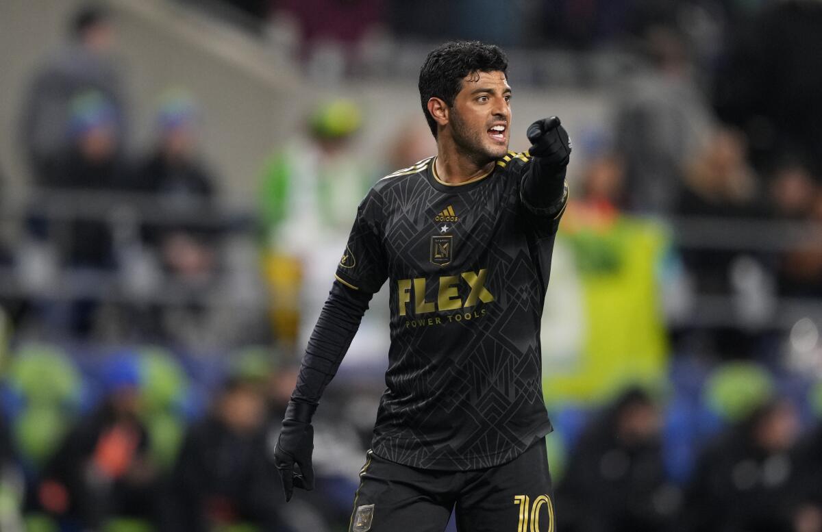 LAFC forward Carlos Vela points during a win over the Seattle Sounders on Nov. 26.