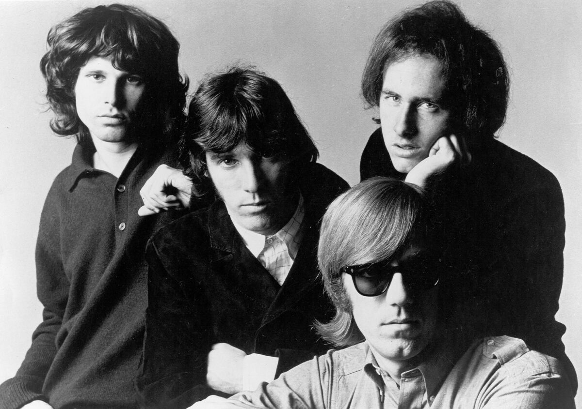 Jim Morrison, Ray Manzarek, Robbie Krieger and John Densmore of "The Doors" pose for a promotional photos circa 1966.