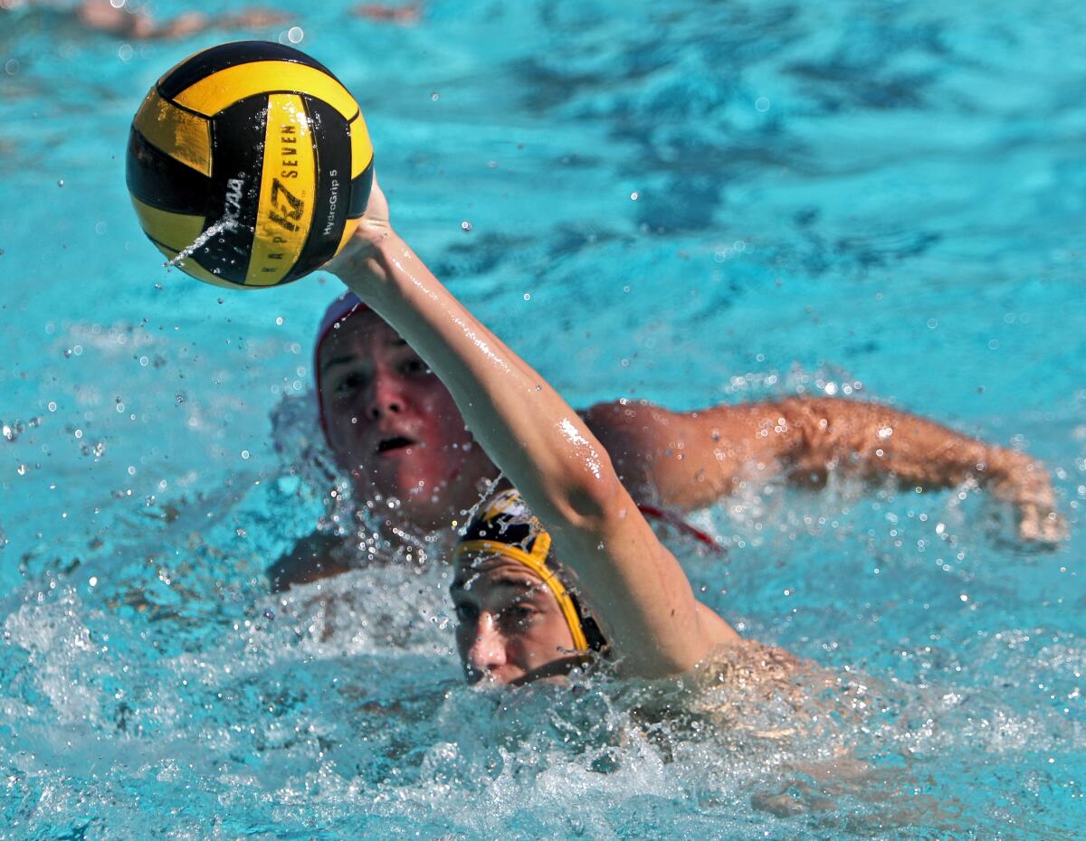 St. Francis High School water polo player Robert Alietti gets away from the defense and scores in CIF Southern Section Division V quarterfinal match vs. Burroughs High School at Notre Dame High School in Sherman Oaks on Saturday, Nov, 9, 2019. St. Francis won the match 9-8.