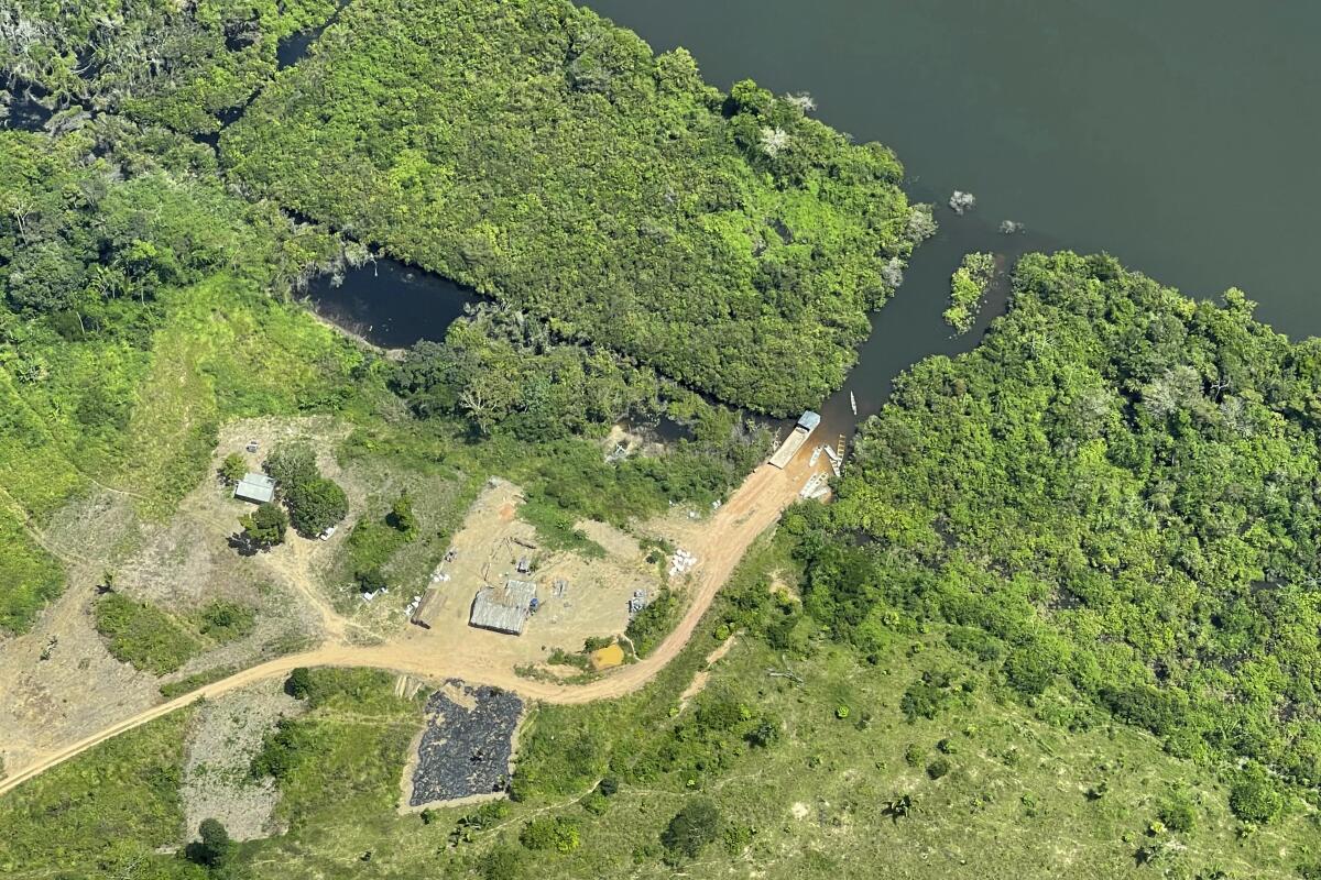 An aerial photo shows an illegal road inside a protected area in the Brazilian Amazon. 