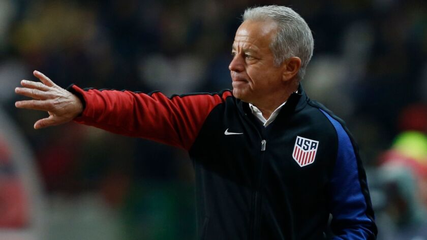 Dave Sarachan coaches the U.S. men's soccer team against Portugal on Nov. 14.