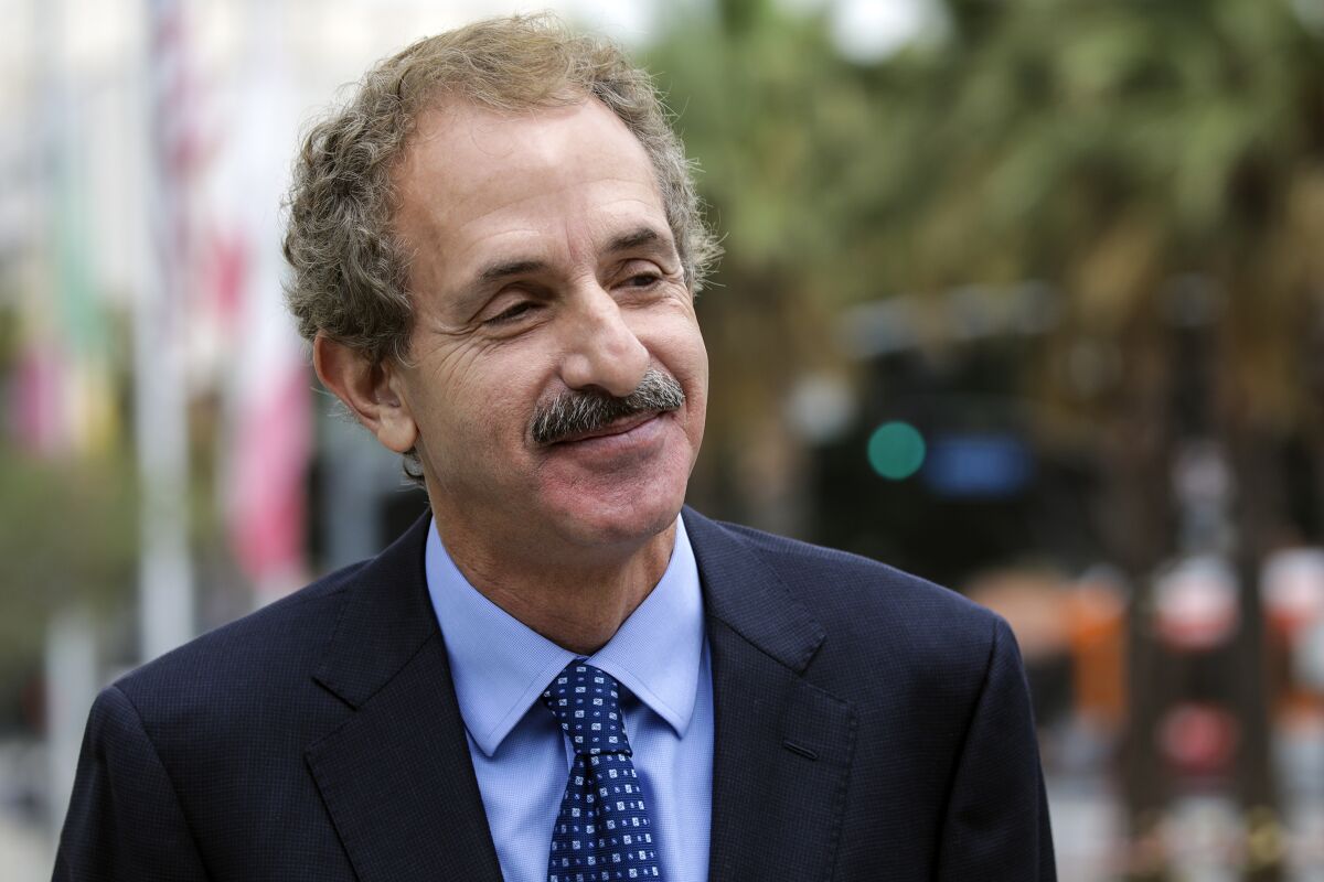City Atty. Mike Feuer at a news conference in August outside LAPD headquarters.