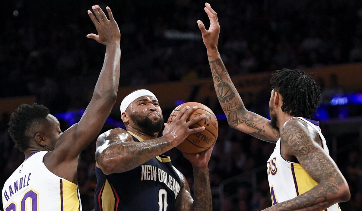 Former New Orleans center DeMarcus Cousins (0) has joined Golden State while former Lakers forward Julius Randle is in Houston. Brandon Ingram, right, is still part of the Lakers' young corps that will team with LeBron James.