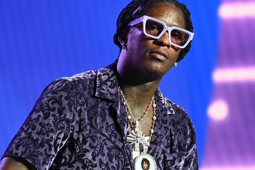 ATLANTA, GEORGIA - NOVEMBER 13: Rapper Young Thug speaks onstage at the 2021 REVOLT Summit at 787 Windsor on November 13, 2021 in Atlanta, Georgia. (Photo by Paras Griffin/Getty Images)