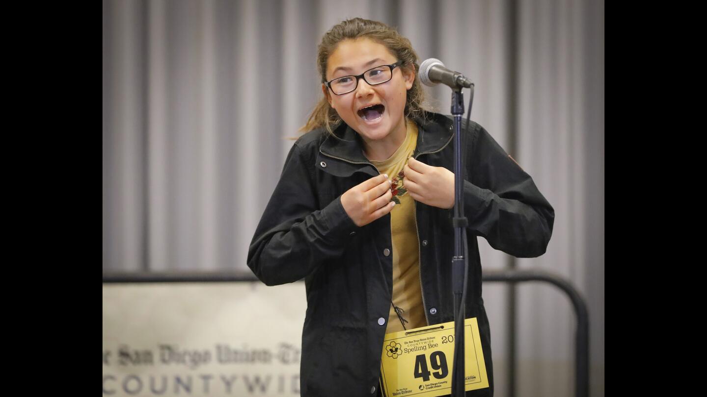 Lisbon Zeigler of Longfellow Elementary School reacts after answering her question correctly in the second round during the 50th annual San Diego Union-Tribune Countywide Spelling Bee held at the Town and Country San Diego.