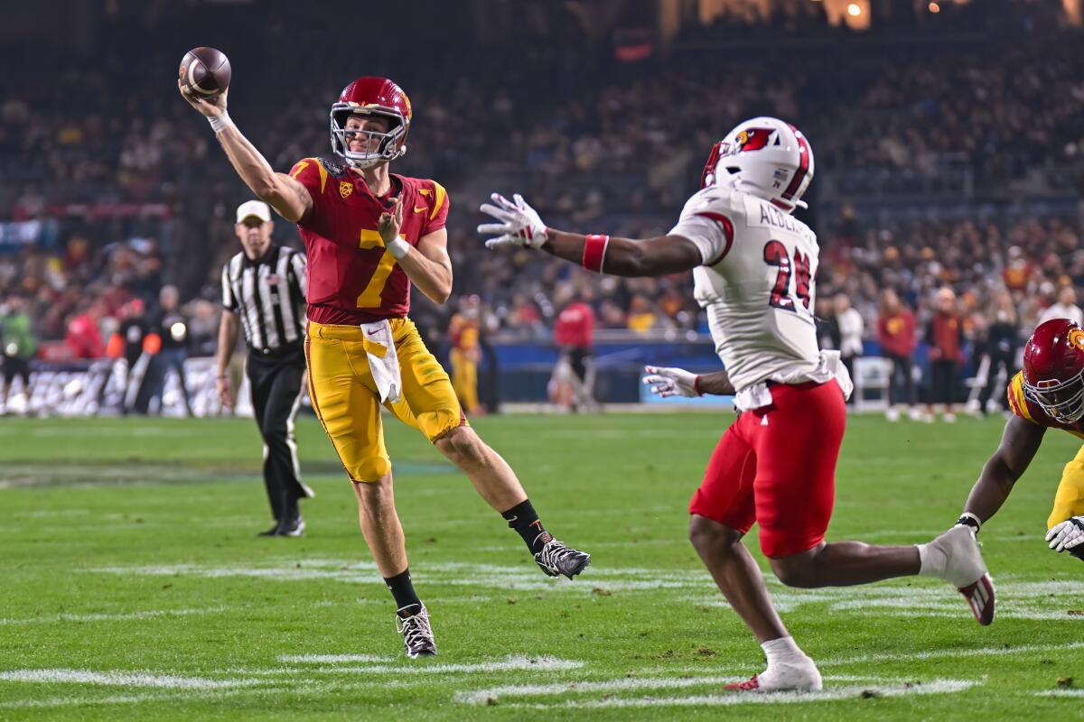 USC quarterback Miller Moss throws during the Trojans' win over Louisville in the Holiday Bowl.