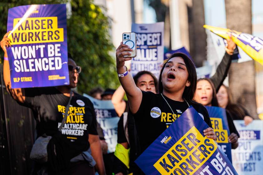 Kaiser employees picket and rally at Kaiser Permanente Los Angeles Medical Center in Los Angeles.