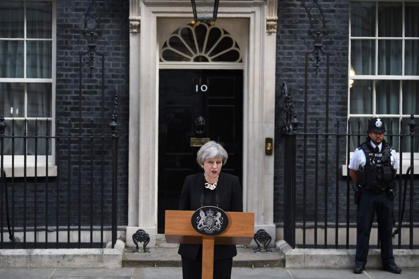 Britain's Prime Minister Theresa May delivers a statement outside 10 Downing Street in central London on June 4, 2017, following the June 3 terror attack.