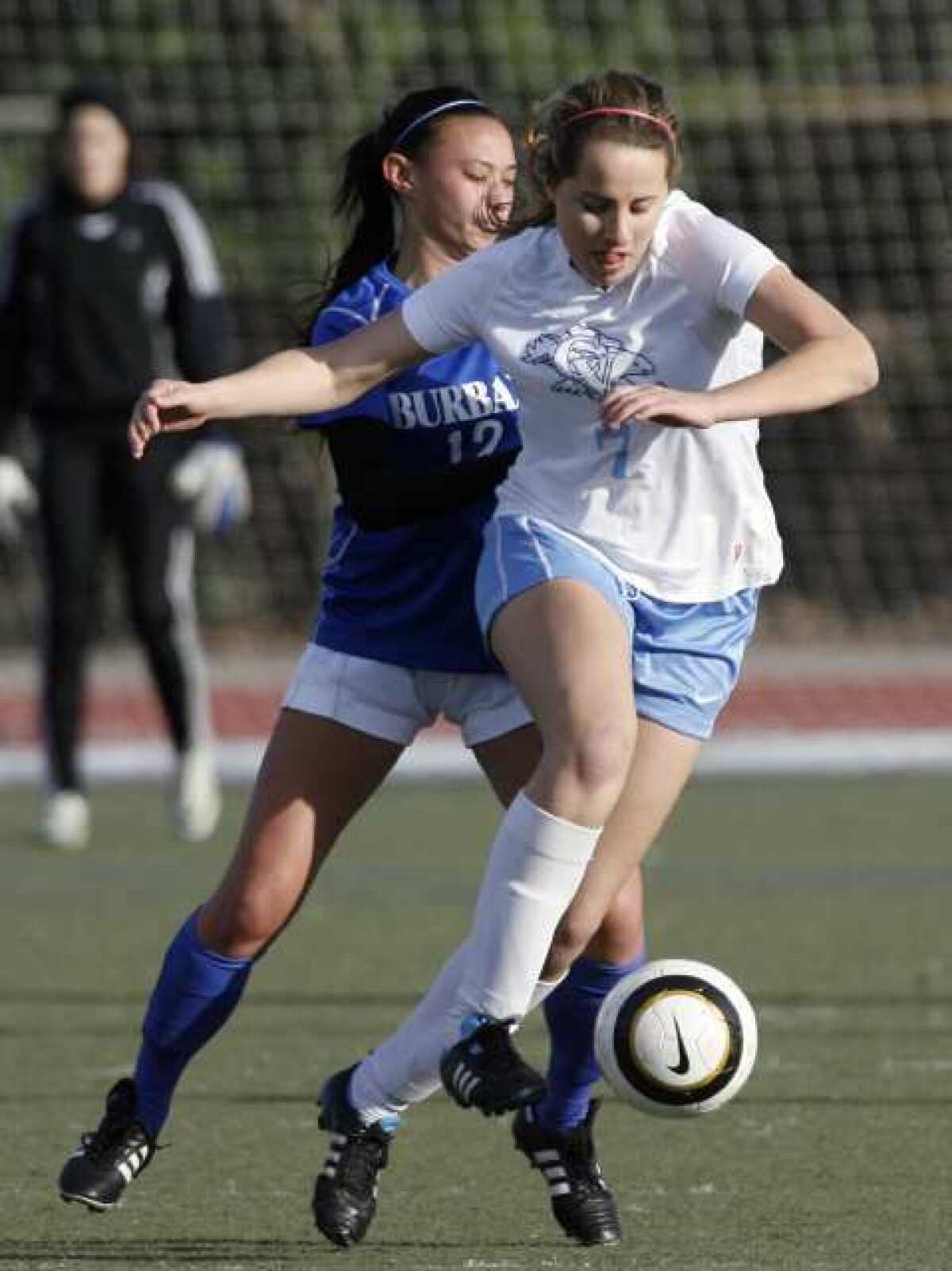 CV's Whitley Boller drives the ball past Burbank's Alessia Dal Monte.