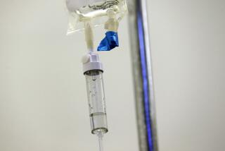 Chemotherapy drugs are administered to a patient at a hospital in Chapel Hill, N.C. 