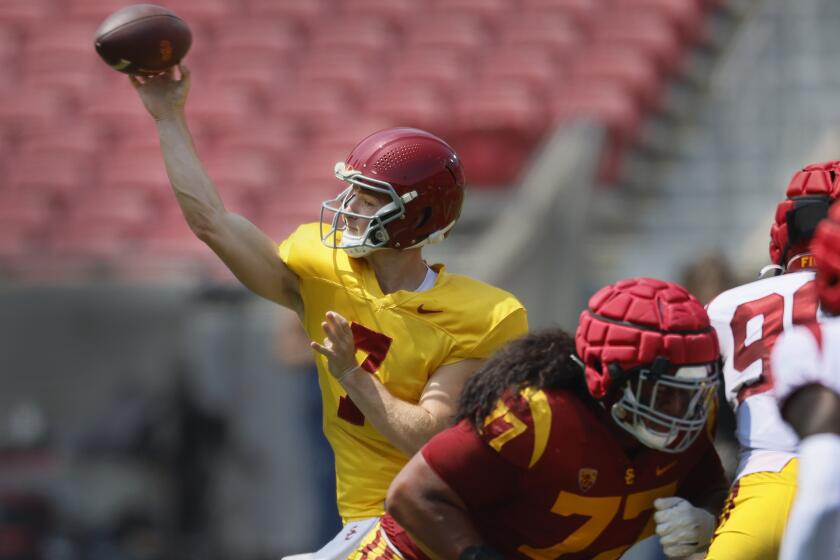 Los Angeles, CA - April 20: USC quarterback Miller Moss, #7, throws the ball during.