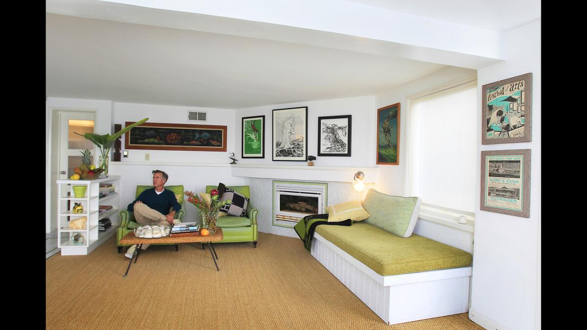 He began by stripping the apartment of its Mediterranean villa trappings with the idea of turning the condo into a classic 1940s beach abode. Painting the brown-and-beige walls a bright white made the space appear larger. His new custom-made daybed features a lift-up storage compartment.