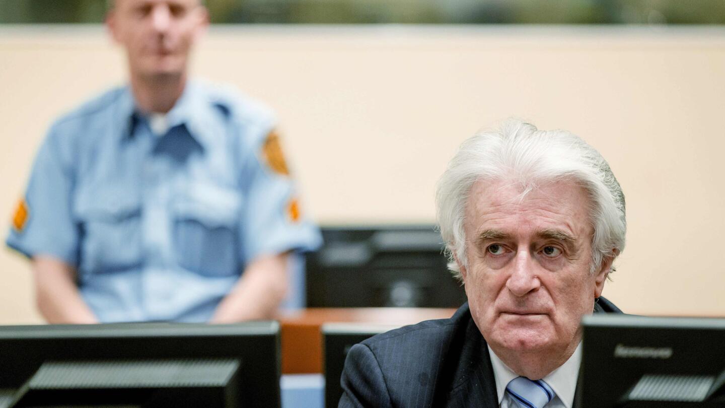 Bosnian Serb wartime leader Radovan Karadzic sits in the courtroom for the reading of his verdict at the International Criminal Tribunal for Former Yugoslavia (ICTY) in The Hague on March 24, 2016. The former Bosnian-Serbs leader is indicted for genocide, crimes against humanity, and war crimes.