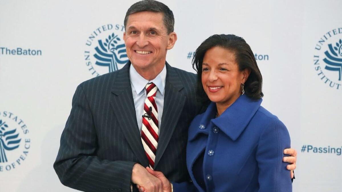 White House national security advisor Susan Rice with her designated successor, retired Gen. Michael Flynn.
