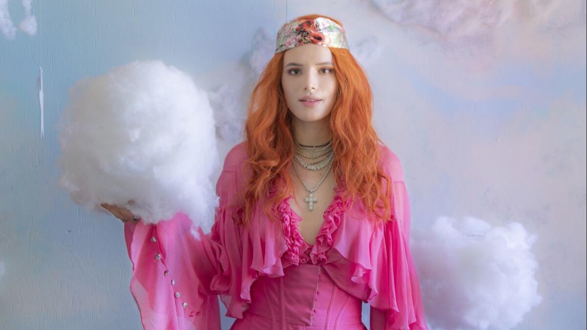 Bella Thorne, who has four films coming out this fall, poses in her home, which she decorated with colorful art projects.