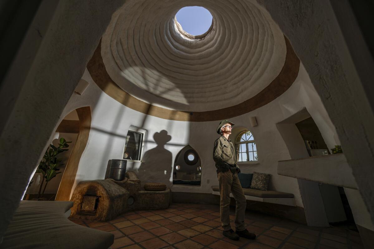 Site director Ian Lodge inside one of the fully staged CalEarth structures.