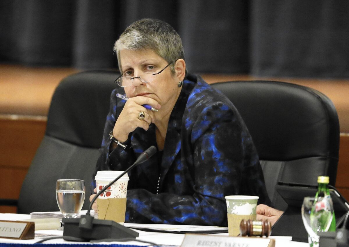 University of California President Janet Napolitano listens as student speakers denounce her plan to raise tuition during a meeting of the university Board of Regents on Wednesday in San Francisco.