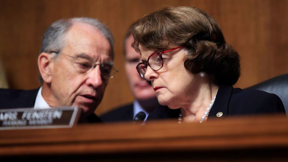 Senate Judiciary Committee Chairman Sen. Charles Grassley of Iowa, confers with ranking member, Sen. Dianne Feinstein of California during a hearing on Capitol Hill in Washington, Wednesday, Sept. 6, 2017, regarding Eric Dreiband's nomination to be Assistant Attorney General, Civil Rights Division. (AP Photo/Manuel Balce Ceneta)