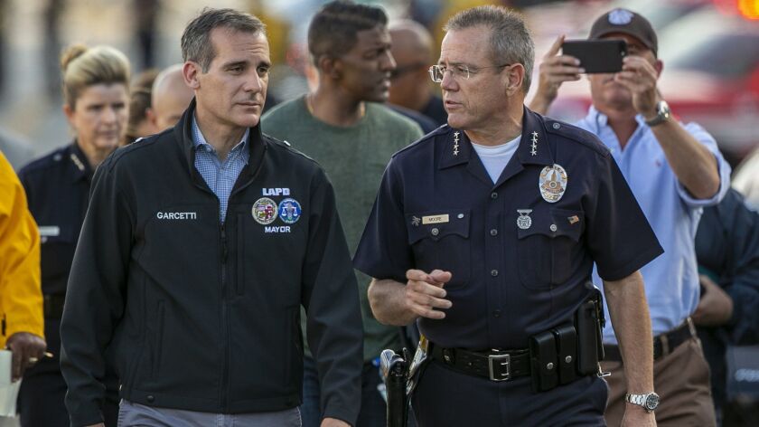 L.A. Mayor Eric Garcetti, left, and Police Chief Michel Moore on July 21.