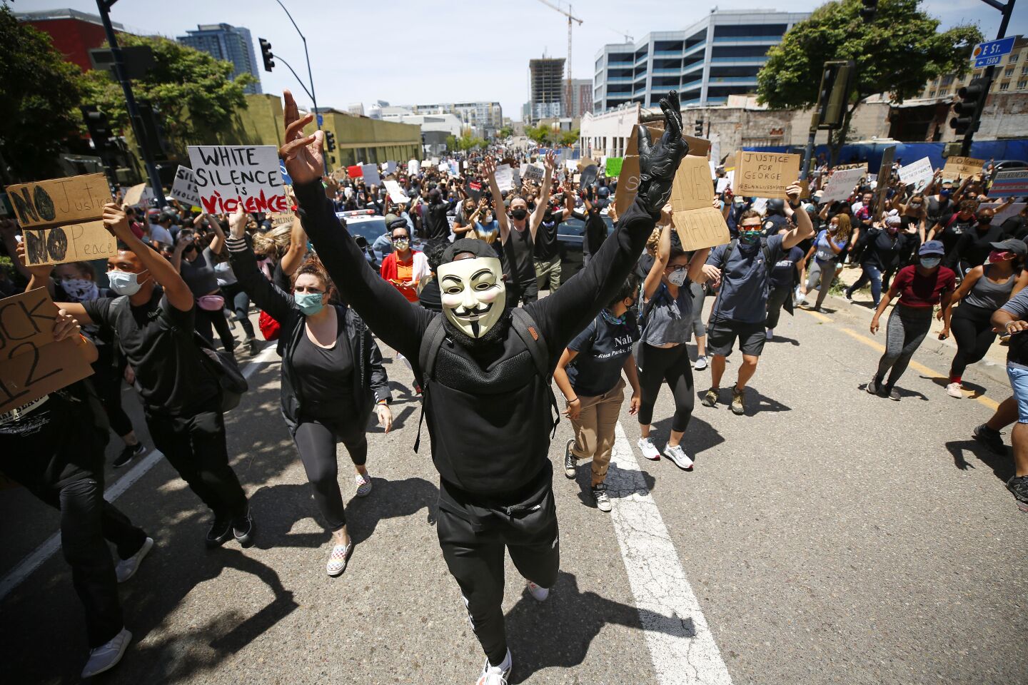 A group protesting the death of George Floyd march on I-5 in downtown San Diego on May 31, 2020.