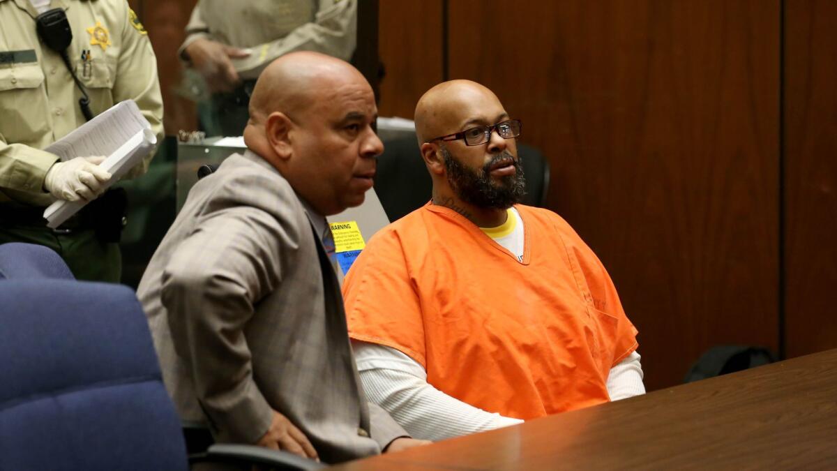 Marion "Suge" Knight, right, appears in court on robbery charges in 2015 with then-attorney Matthew Fletcher, pictured next to him.