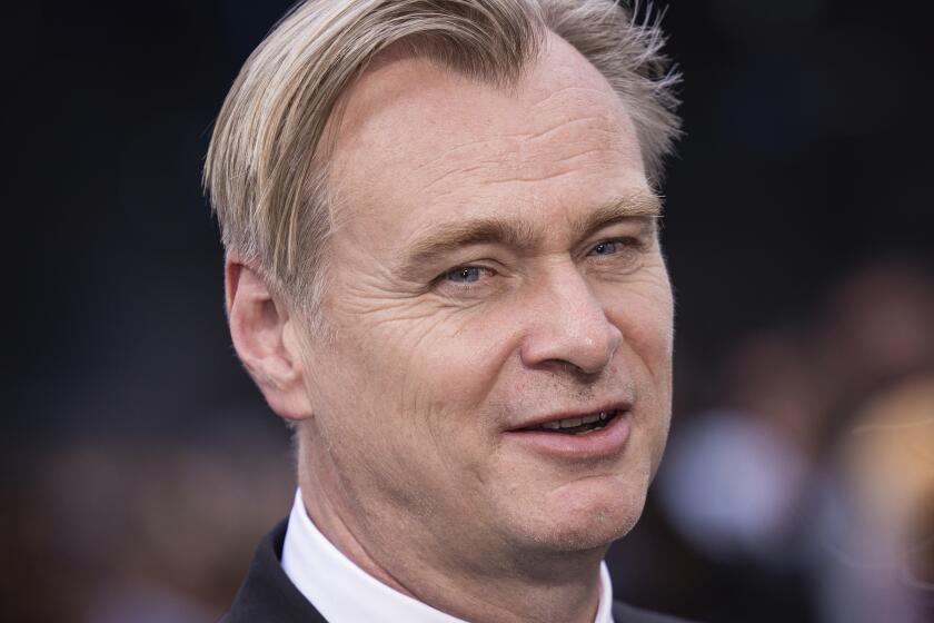 Director Christopher Nolan poses for photographers upon arrival at the premiere for the film 'Oppenheimer' on Thursday, July 13, 2023 in London. (Vianney Le Caer/Invision/AP)