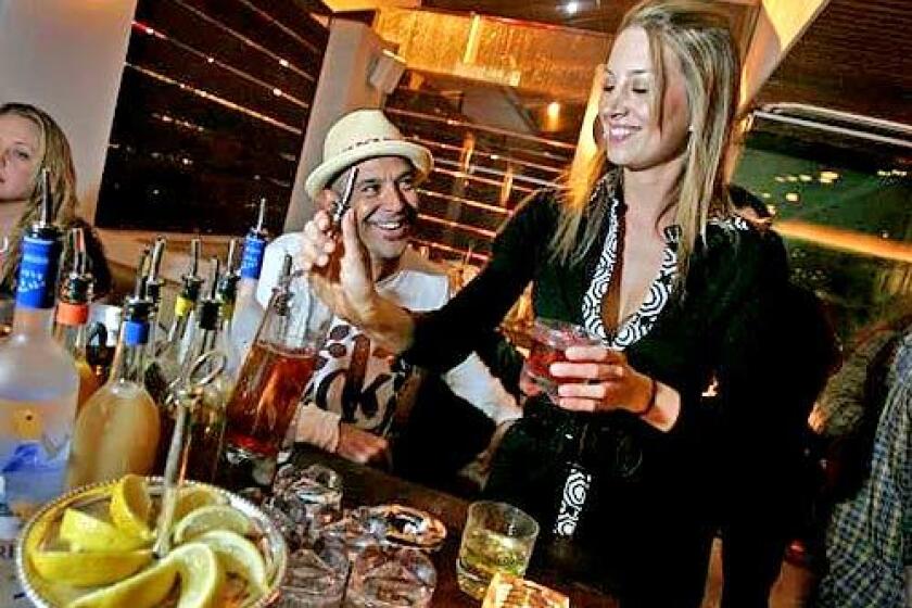 At Area in West Hollywood, a $250 upcharge buys you tableside bartending by the likes of Dorothy Szamborska.